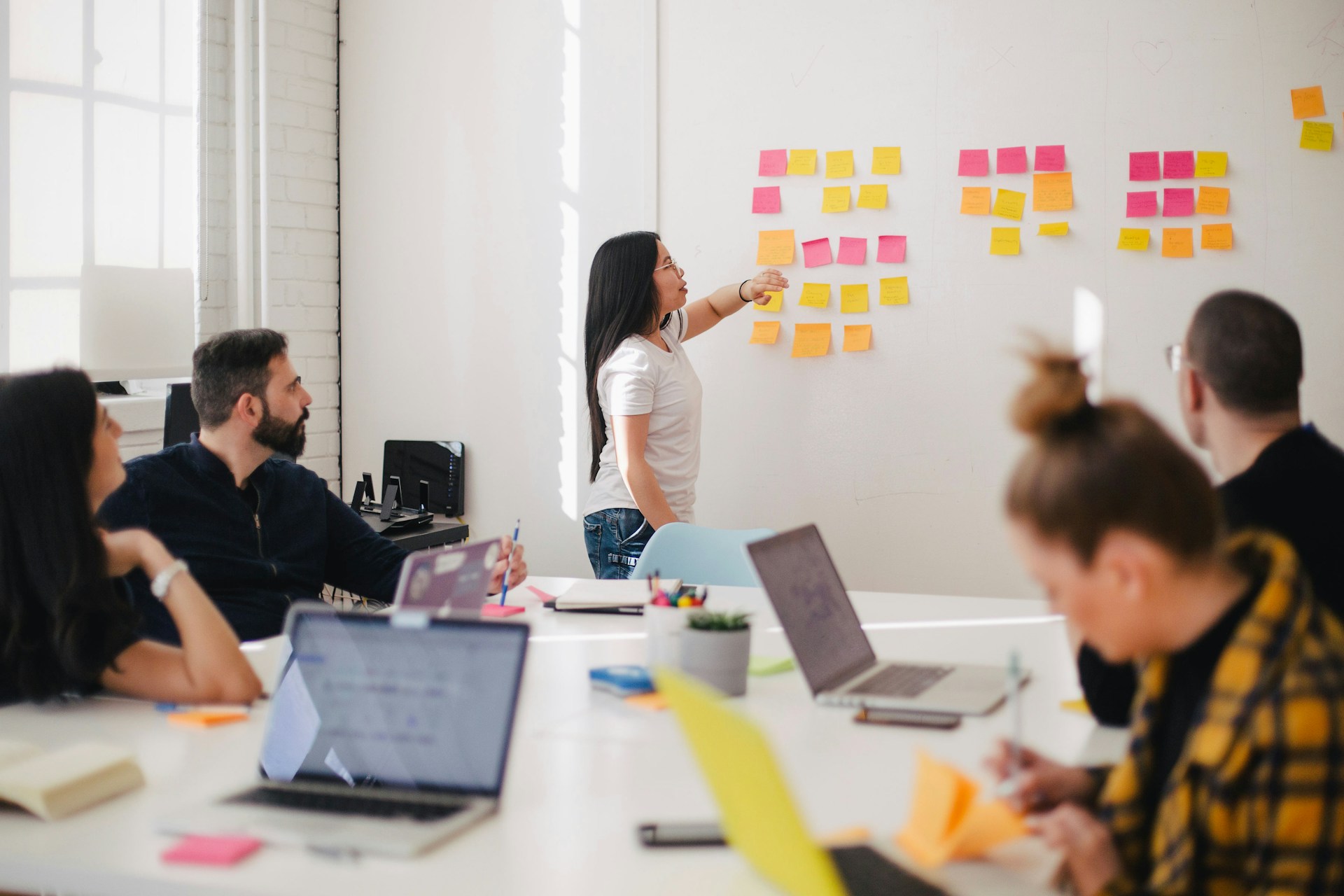 Brand strategy workshop with stakeholders around a table